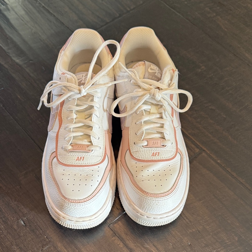 Nike Women’s Air Force 1 White with Light Pink Trim Sneakers